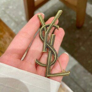 Authentic Yves Saint Laurent logo brooch